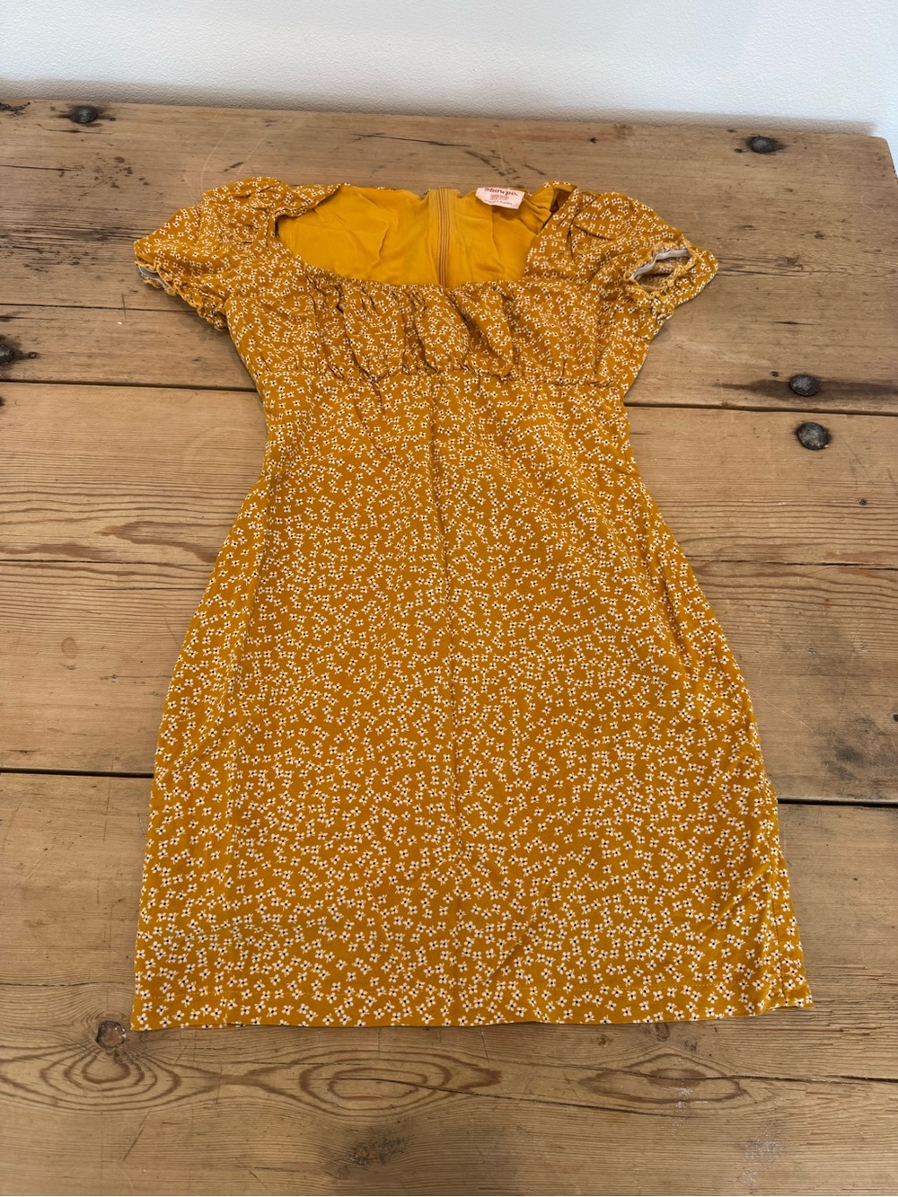 Showpo mini milkmaid dress in size 4